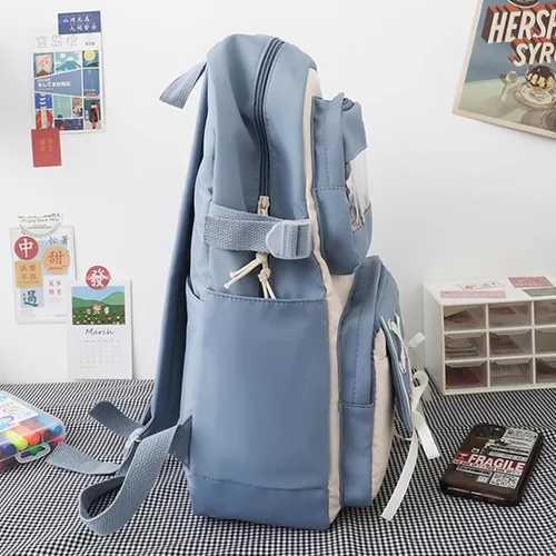 Vista 4 de Roffatide Anime Kuromi - Mochila Kawaii con 21 piezas de accesorios de dibujos animados estética de viaje nuevo semestre bolsa de regalo con bonitos