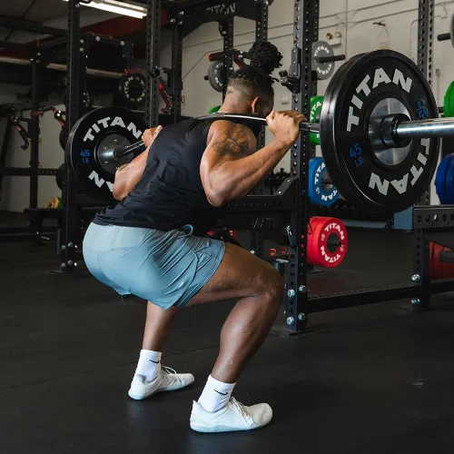 Vista 6 de Titan Fitness Barra eléctrica Yukon de óxido negro, barra olímpica de 96 pulgadas con curvatura de 6 pulgadas para mayor comodidad durante