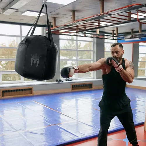 Vista 6 de Meister Bolsa pesada de bola de demolición llena de 60 libras para boxeo y MMA - Negro