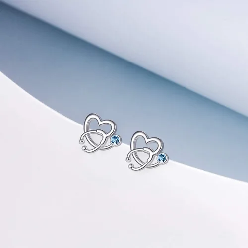 Vista 2 de AOBOCO - Aretes tipo dormilona de plata esterlina con forma de estetoscopio y piedras natales de imitación, joyería fina para regalo enfermero