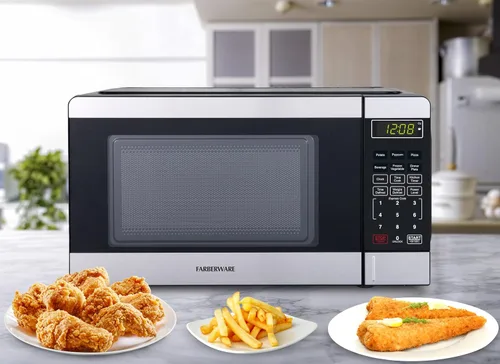 Vista 6 de [Usado] Farberware - Horno microondas de encimera de 0.7 pies cúbicos – 700 vatios de potencia, configuraciones de cocción automática, Acero