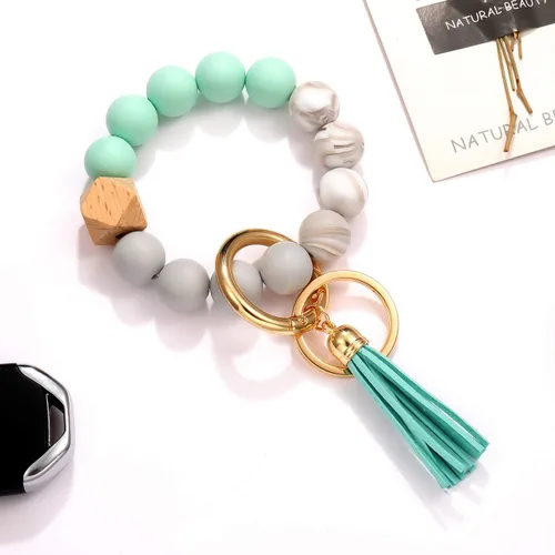 Vista 5 de 4 llaveros de silicona para mujer, pulsera elástica, llavero para casa y automóvil