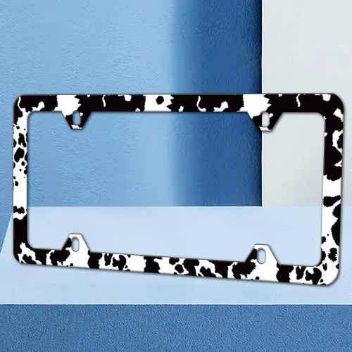 Vista 2 de Marco de matrícula con estampado de vaca en blanco y negro Soporte para placa de matrícula de acero inoxidable con tornillos para mujeres