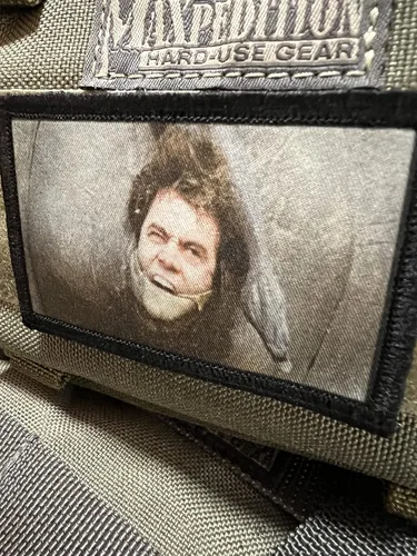 Vista 2 de Ace Ventura Rhino Butt Moral Patch. Gancho y bucle de 2 x 3 pulgadas fabricado en los Estados Unidos