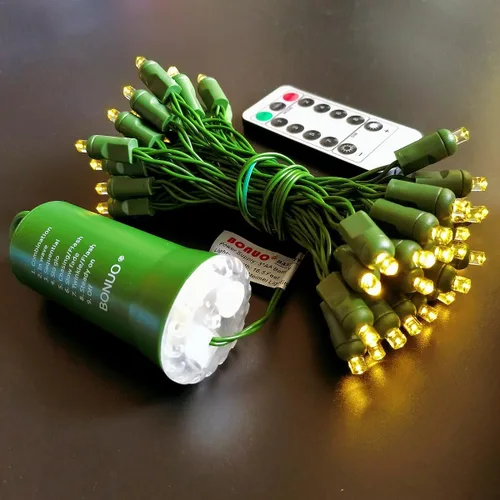 Vista 4 de Luces de Navidad a pilas, 16 pies, 50 unidades, mini luces LED con temporizador remoto, 8 modos para interiores y exteriores, árbol, jardín, corona