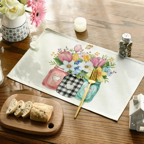 Vista 3 de Artoid Mode Juego de 4 manteles individuales de primavera con diseño de flores silvestres y mariposas, 12 x 18 pulgadas, para decoración de fiestas