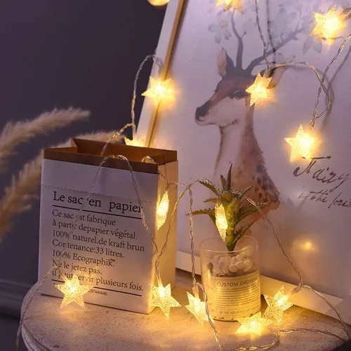Vista 2 de ANJAYLIA 20 luces LED de cadena de estrellas de 10 pies, luces de hadas de Navidad operadas con batería para decoración interior y exterior, fiesta