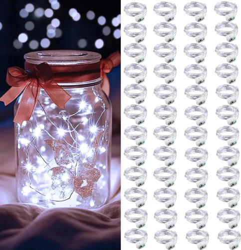 Vista 13 de AIKEI Paquete de 12 luces LED de hadas que funcionan con pilas, guirnaldas de luces impermeables de 7 pies, 20 luces LED de luciérnagas estrelladas