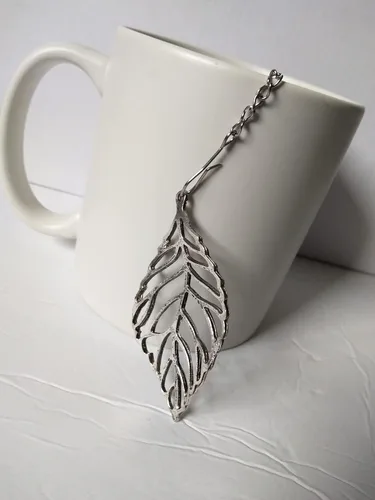 Vista 5 de Bola infusora de té en forma de hoja para preparar tés de hierbas sueltas