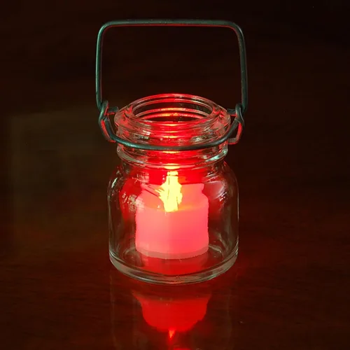 Vista 3 de LumaBase Velas de té a pilas, color morado, juego de 12 Púrpura