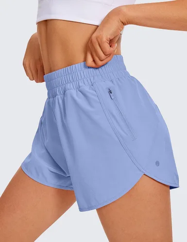 Vista 3 de CRZ YOGA Pantalones cortos para correr para mujer, talle alto, con bolsillo con cremallera, forro de malla, entrepierna de 3 pulgadas, dobladillo