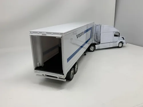 Vista 2 de NewRay tractor y remolque Volvo VN-780, escala 1/32. Modelo prearmado de camión con semi color blanco
