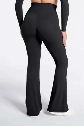 Vista 5 de Sunzel Leggings acampanados, pantalones deportivos y cruzados para yoga, con control de abdomen, cintura alta y piernas anchas