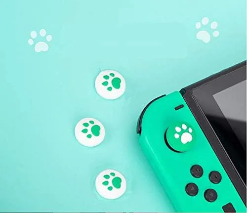 Vista 2 de Tapas de silicona para el pulgar con diseño ergonómico, color verde y verde