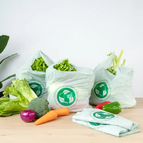 Vista 9 de Restaurantware -Bolsas de comestibles de tamaño 1/6, 100 bolsas de plástico duraderas - Asas de camiseta, bolsa de compras de plástico verde de alta