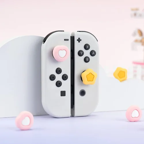 Vista 5 de GeekShare Lindas tapas de silicona con agarre para pulgar, cubierta de joystick compatible con Nintendo Switch OLED Switch Lite, 4