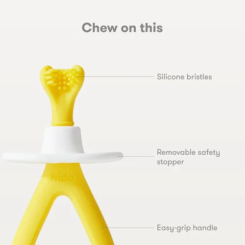 Vista 4 de Frida Baby Cepillo de dientes de entrenamiento para bebés con cerdas de silicona suave, amarillo