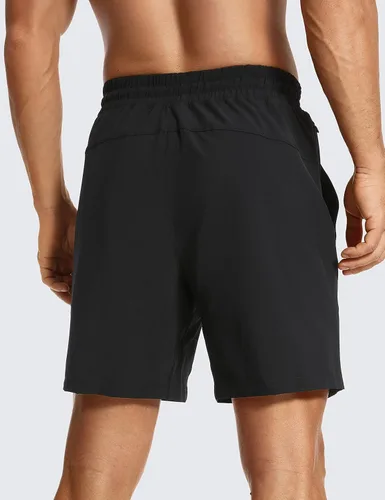 Vista 2 de CRZ YOGA Pantalones cortos de entrenamiento sin forro para hombre, 7 pulgadas, secado rápido, para correr, deportes, gimnasio, con bolsillos