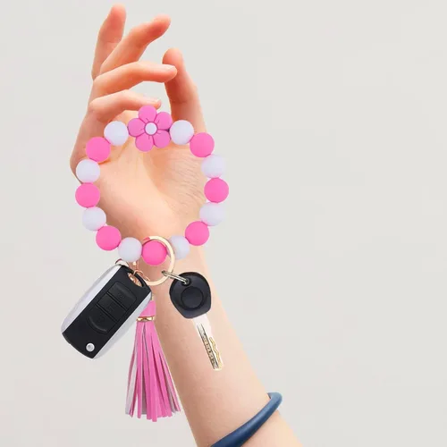 Vista 4 de Elegante pulsera de silicona con cuentas para mujer, llavero con clip de oro, soporte multifuncional para llaves