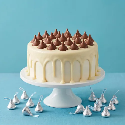 Vista 5 de Besos de chocolate con leche, caramelos plateados envueltos individualmente