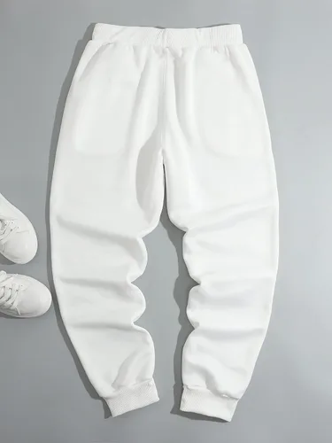 Vista 2 de OYOANGLE Pantalones deportivos con estampado de dibujos animados para hombre, pantalones deportivos para correr, gimnasio, entrenamiento con bolsillo