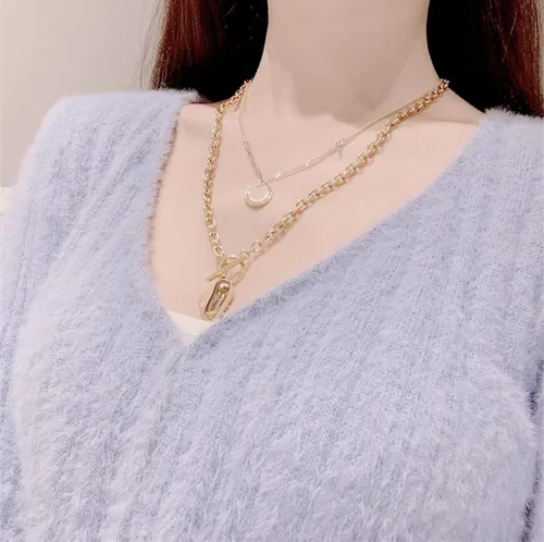 Vista 5 de Juego de collar de pulsera de plata con dije chapado en oro rosa de 18 quilates y cadena de acero inoxidable gruesa con forma de corazón