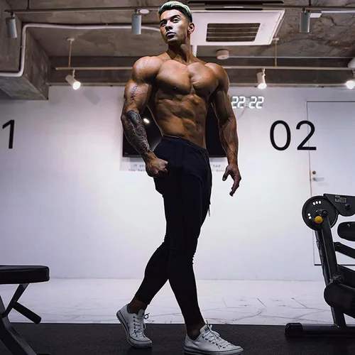 Vista 7 de BUXKR - Pantalones deportivos ajustados con bolsillos profundos para hombre para gimnasio correr y fisioculturismo