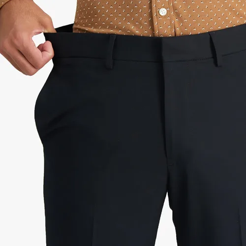 Vista 4 de Haggar Pantalón de vestir elástico en 4 direcciones para hombre