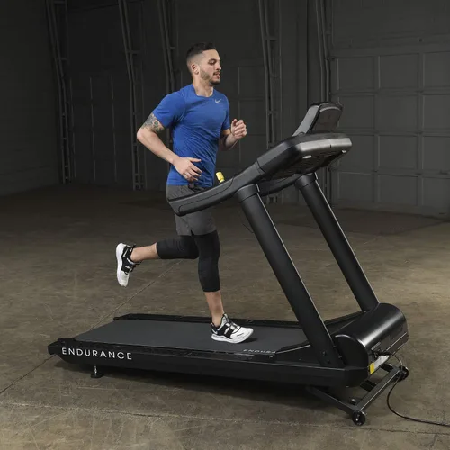 Vista 2 de Endurance by Body-Solid (T150) Cinta de correr inclinada para correr y caminar, capacidad de peso de 400 libras, máquina de correr con motor