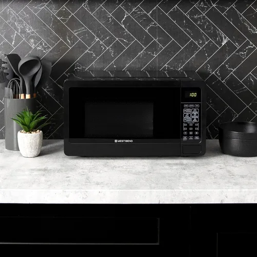 Vista 3 de West Bend Horno microondas compacto de 700 vatios con 6 ajustes de cocción preestablecidos, descongelación rápida, panel de control electrónico