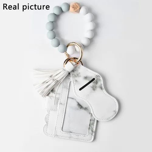 Vista 2 de KESOCORAY Pulsera de pulsera para mujer, llavero con cuentas de silicona, llavero con borla