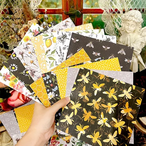 Vista 2 de Paquete de papel de origami con patrón de abeja, 24 hojas de una cara de 6 x 6 pulgadas, fondo de miel, álbum de recortes de panal de abeja, papel