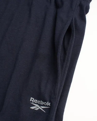 Vista 5 de Reebok Pantalones deportivos para hombre - Pantalones deportivos ligeros de ajuste clásico con parte inferior abierta (S-XL)