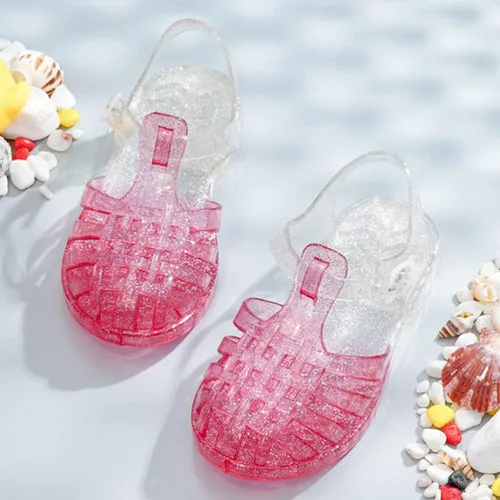 Vista 7 de USHOBE Sandalias de jalea de princesa para niñas, sandalias de verano para la playa, zapatos de gelatina con purpurina, sandalias planas