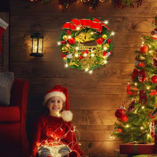 Vista 2 de Corona de Navidad artificial preiluminada, 12 pulgadas para puerta delantera, decoración de invierno de vacaciones con luces LED a