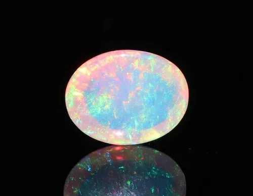 Vista 3 de Cabujón de piedras preciosas sueltas de ópalo blanco etíope ultra fuego ovalado Welo natural de ópalo de fuego (1 unidad) piedra natal curativa