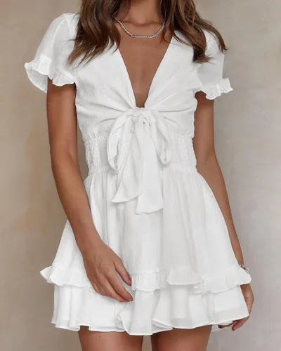 Vista 4 de PRETTYGARDEN - Mini vestido de verano con vuelo para mujer. Vestido corto acampanado con cuello en V y manga corta con volantes en la parte delantera