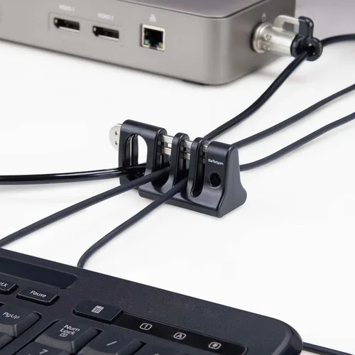 Vista 7 de StarTech - Bloqueo de anclaje para cable periférico, TAA (organizador de cables) Uso con cable de seguridad para laptop, teclado/mouse seguro