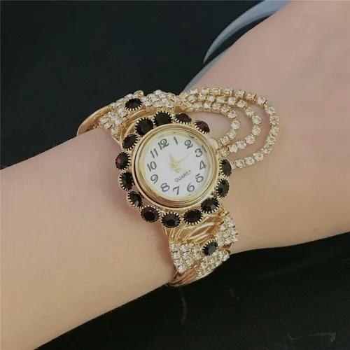 Vista 3 de CdyBox Reloj de pulsera de cuarzo con tachuelas de diamantes para mujer, reloj de pulsera de aleación abierta de moda