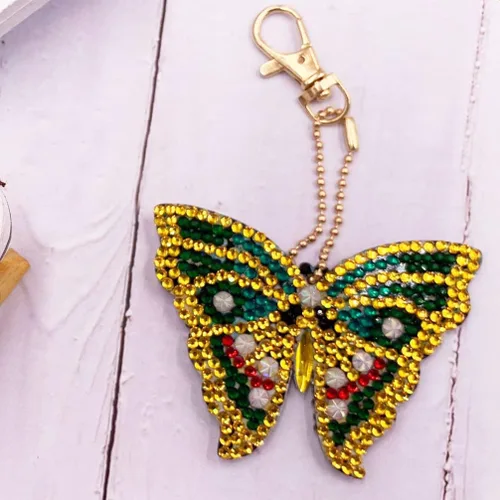 Vista 9 de EXCEART Llaveros de pintura con diamantes de imitación de mariposa bolso colgante para niñas y mujeres abalorio de teléfono 5 piezas