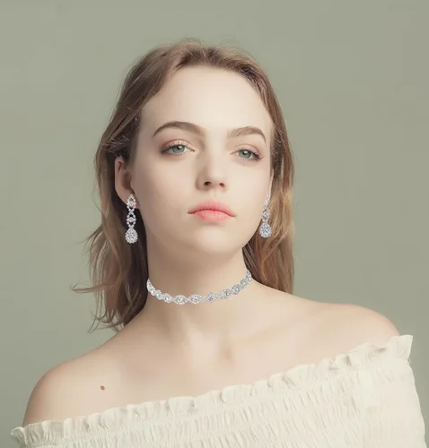 Vista 2 de Paxuan - Juego de joyas con collar, pulsera y aretes, para mujer, con cristales de diamantes de imitación, para novias y bodas