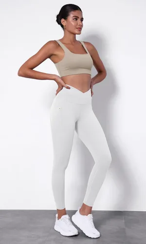 Vista 4 de ODODOS Leggings de yoga con cintura cruzada para mujer con bolsillos, pantalones de yoga de entrenamiento cruzado de 2528 pulgadas