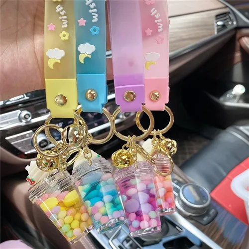 Vista 6 de Xinbalove Lindas bolsas de botella de helado para muñeca con colgante de llavero de coche para niños, niñas y mujeres, llavero flotante de jalea
