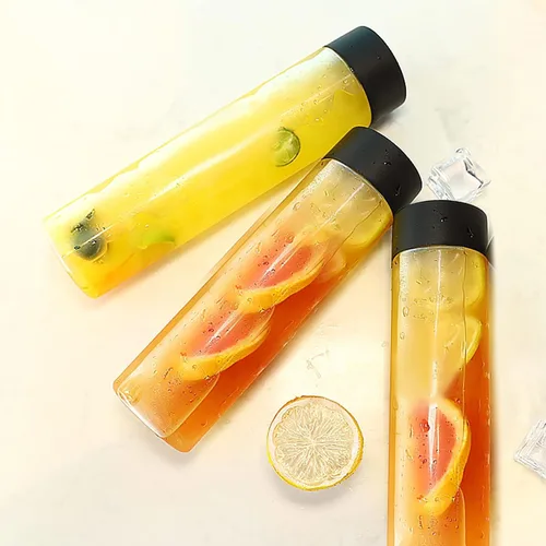 Vista 4 de Paquete de 12 botellas redondas de plástico de 16 onzas con tapas, recipientes de jugo con tapas para botella de batidos, botellas de jugo