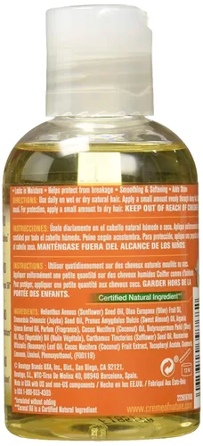 Vista 2 de Creme of Nature Aceite esencial de tratamiento 7 de leche de coco, 4 onzas, 4 onzas líquidas (paquete de 1)