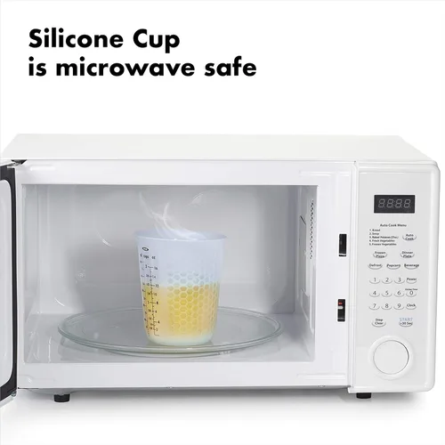 Vista 3 de 1 taza de medir de silicón para exprimir y verter, con patrón Stay-Cool, de la marca Oxo Good Grips, Transparente
