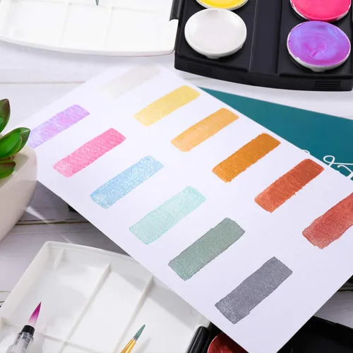 Vista 3 de Dyvicl Juego de pintura de acuarela metálica con purpurina, 12 acuarelas que cambian de color brillante, caja portátil con cepillo de agua, pinturas