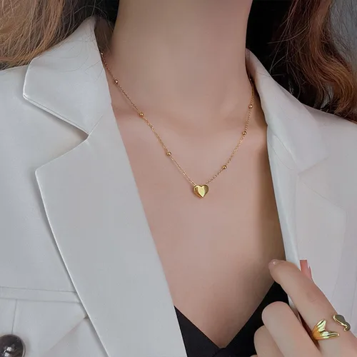Vista 4 de Paquete de 2 collares con dije de corazón de circonita cúbica de titanio para mujeres, adolescentes y niñas, de acero inoxidable, cadena de capa