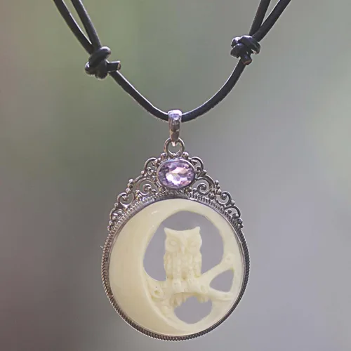 Vista 4 de NOVICA Collar con colgante de hueso de amatista hecho a mano artesanal, plata de ley 925, cuero de Indonesia, piedra natal con temática de animales