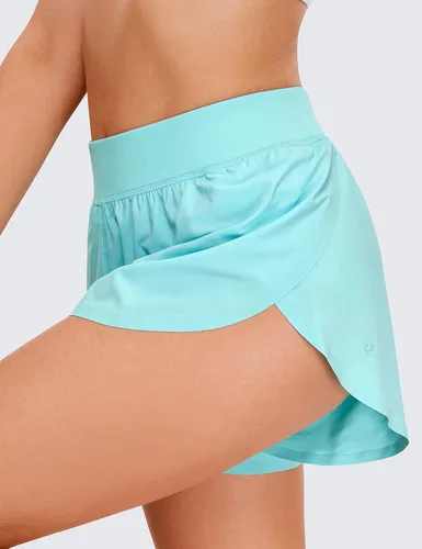 Vista 3 de CRZ YOGA Pantalones cortos de correr de delfín de cintura alta para mujer, de secado rápido, ligero, forro alto, pantalones cortos de entrenamiento
